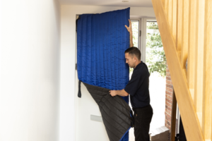 domestic-removals-moveit2 Uniformed Move It crew loading a family home on moving day in Rochford